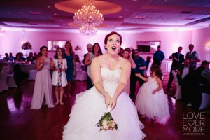 Love Ever More wedding photographer bride bouquet toss windsor ballroom nj